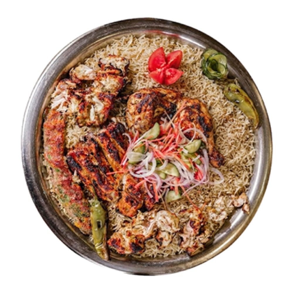 BBQ Feast Platter, Malai Boti, flame-grilled Leg Tikka and a duo of Chicken & Beef Kebabs, served with seasoned rice, fresh vegetables and signature sauces, Sufraq Karachi