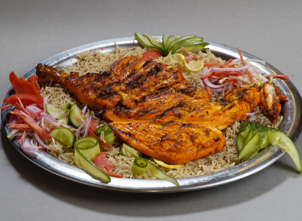 Classic Mandi, Rice topped with grilled chicken, veggies and sauces, Sufraq Karachi