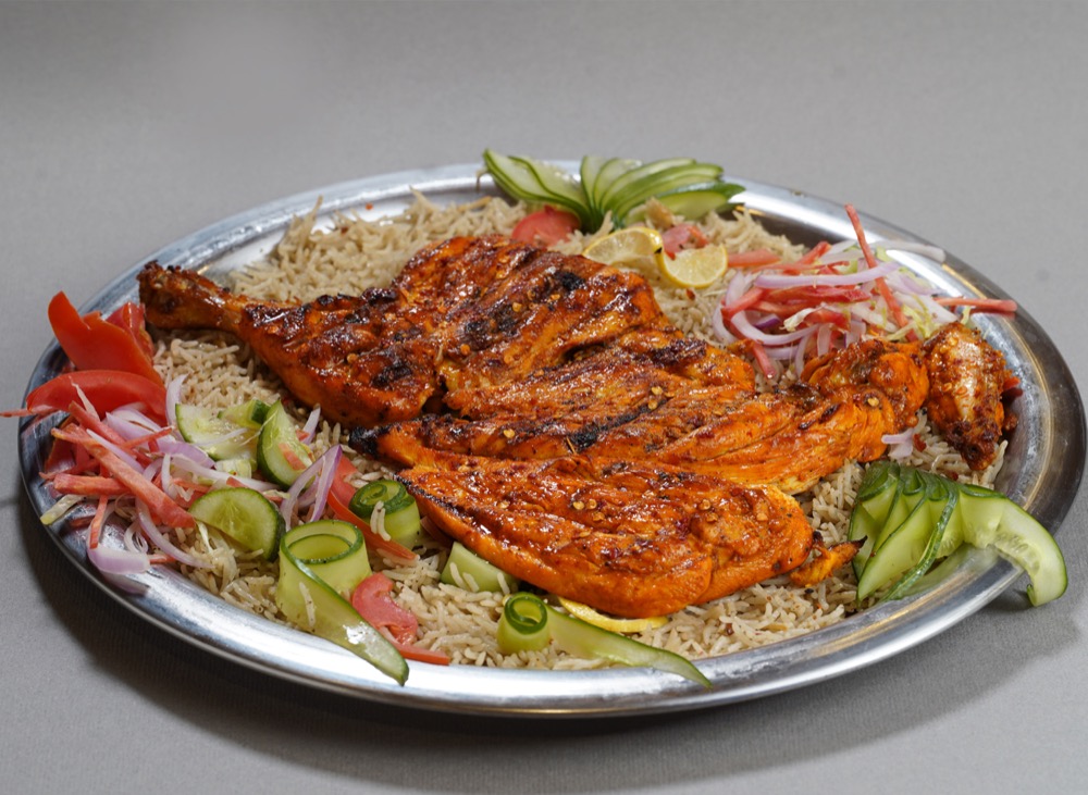 Peri Peri Mandi, Traditional mandi rice with a peri peri twist, grilled chicken, veggies and sauces, Sufraq Karachi