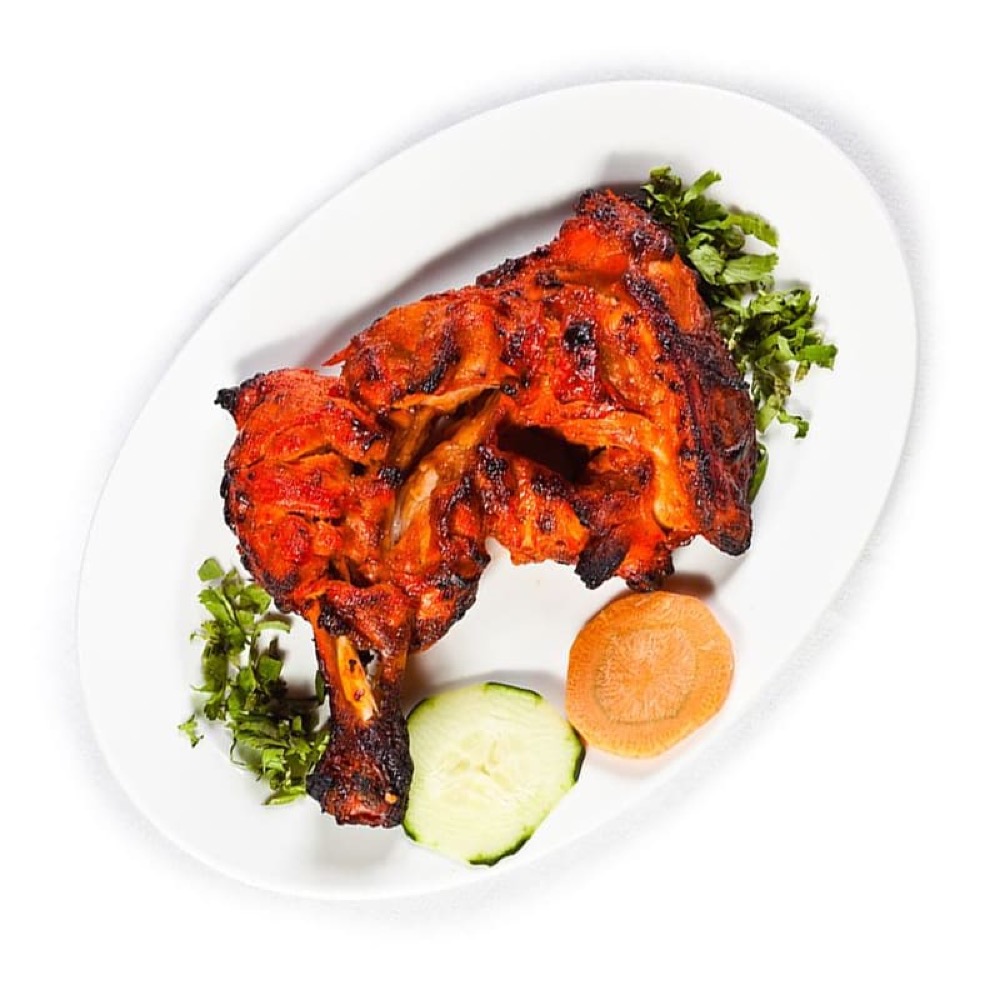 Tikka Leg, Marinated chicken leg, charcoal-grilled with smoky, spiced flavour, Sufraq Karachi